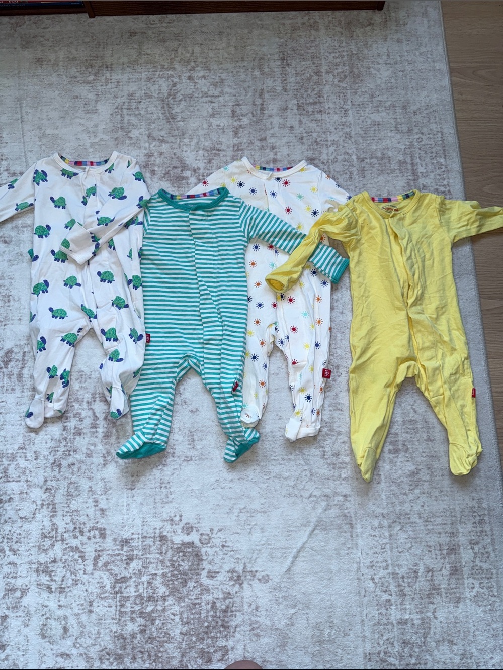 4 pierce Magnetic me footied pajamas (0-3m)